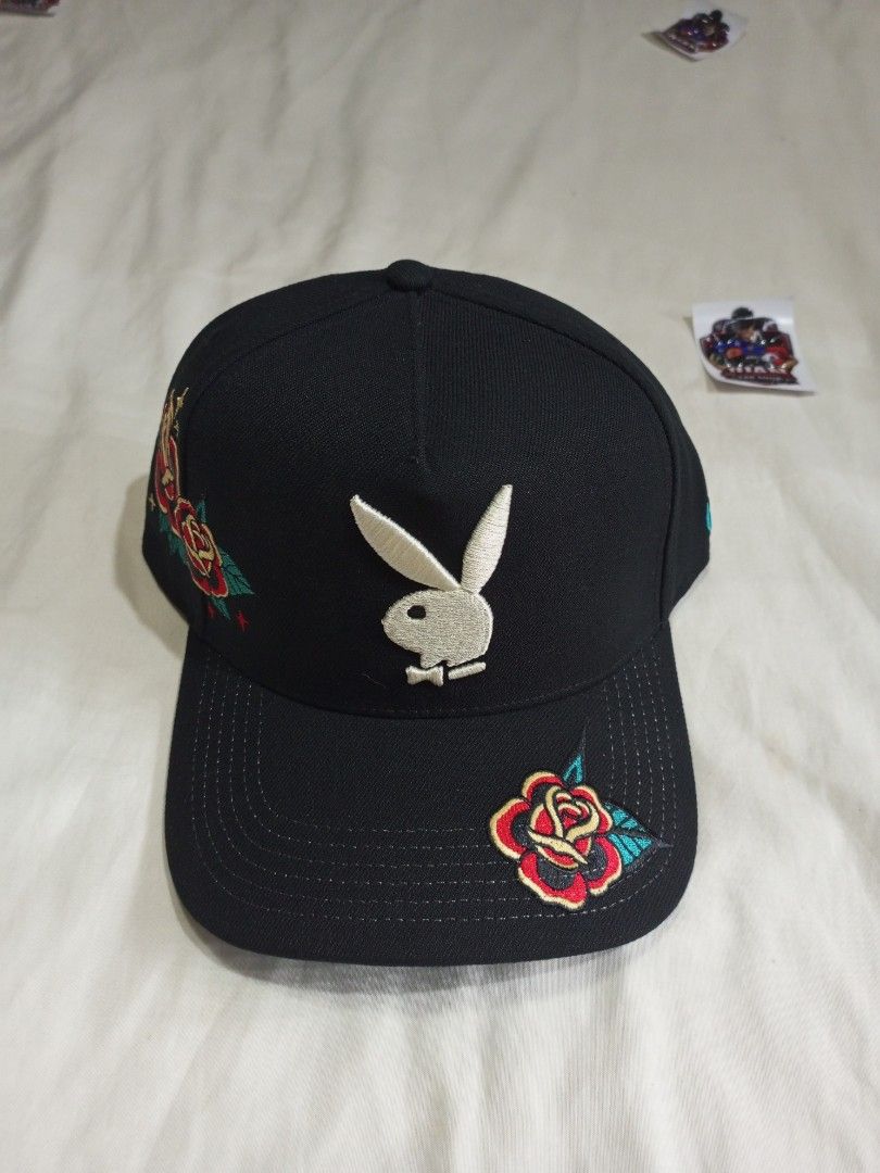 Playboy Embroidered Rose Baseball Cap (Category: Caps & Hats) located in General Santos City (Dadiangas). Submitted by nonoks1234 (Listing ID 1460920059, Image 1). Description: - Black baseball cap - Features embroidered Playboy bunny logo and roses - Adjustable strap for a comfortable fit - One size fits most - Perfect for casual outfits.
