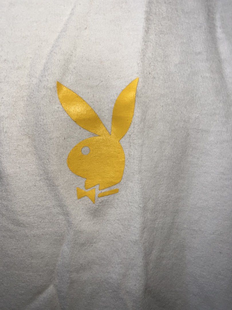 Playboy Graphic T-Shirt White Size M (Category: Tshirts & Polo Shirts ) located in Manila. Submitted by asa68984 (Listing ID 1460881476, Image 3). Description: - White Playboy graphic t-shirt - Tagged size Medium (M) - Large graphic on the back detailing brand history - Small yellow Playboy bunny logo on the front chest - Ideal for everyday casual wear.