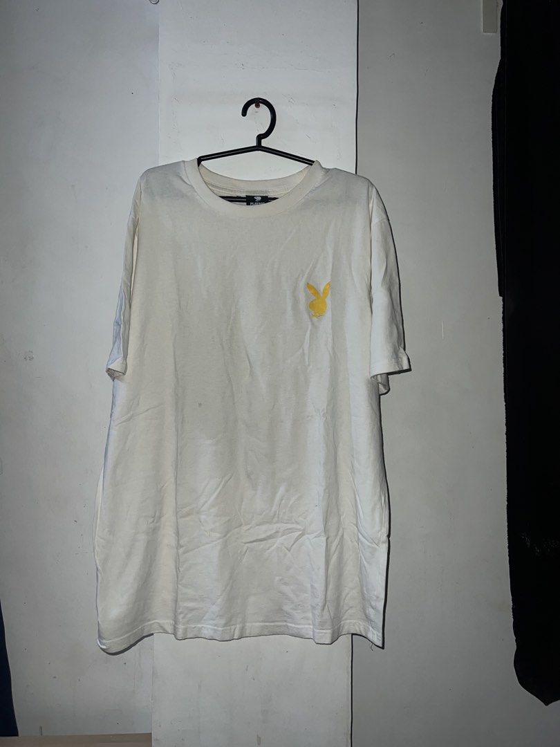 Playboy Graphic T-Shirt White Size M (Category: Tshirts & Polo Shirts ) located in Manila. Submitted by asa68984 (Listing ID 1460881476, Image 2). Description: - White Playboy graphic t-shirt - Tagged size Medium (M) - Large graphic on the back detailing brand history - Small yellow Playboy bunny logo on the front chest - Ideal for everyday casual wear.
