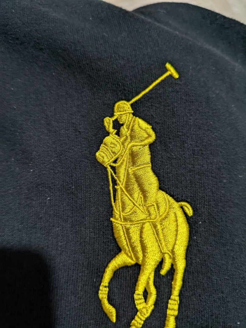 Polo Ralph Lauren RL Jacket (Category: Coats, Jackets and Outerwear) located in Caloocan City. Submitted by jrmanuel493 (Listing ID 1460827621, Image 3). Description: 25 L 22 W - Black zip-up jacket - Yellow RL logo on chest - '3' gr - 'RL' zipper pull - RN 41381 tag - Perfect for casual wear.