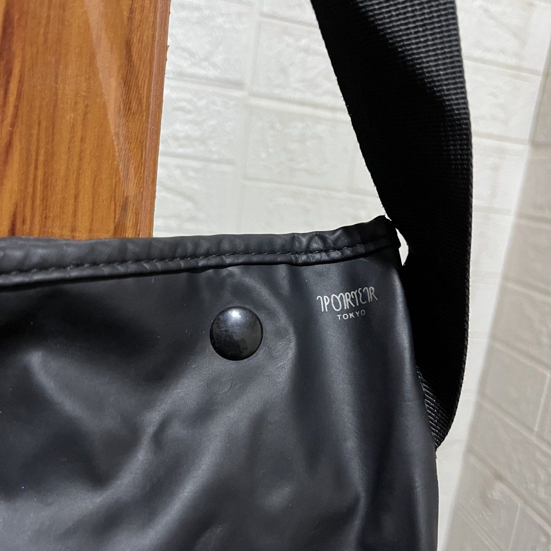 Porter Tokyo Black Messenger Bag (Category: Sling Bags) located in Carmen. Submitted by rr_thrifts (Listing ID 1460716461, Image 2). Description: - Brand: Porter Tokyo - Origin: Made in Japan - Closure: Snap button - Interior: Multiple pockets, some minor marks - Strap: Adjustable - Condition: Overall good - Ideal for: Everyday use.