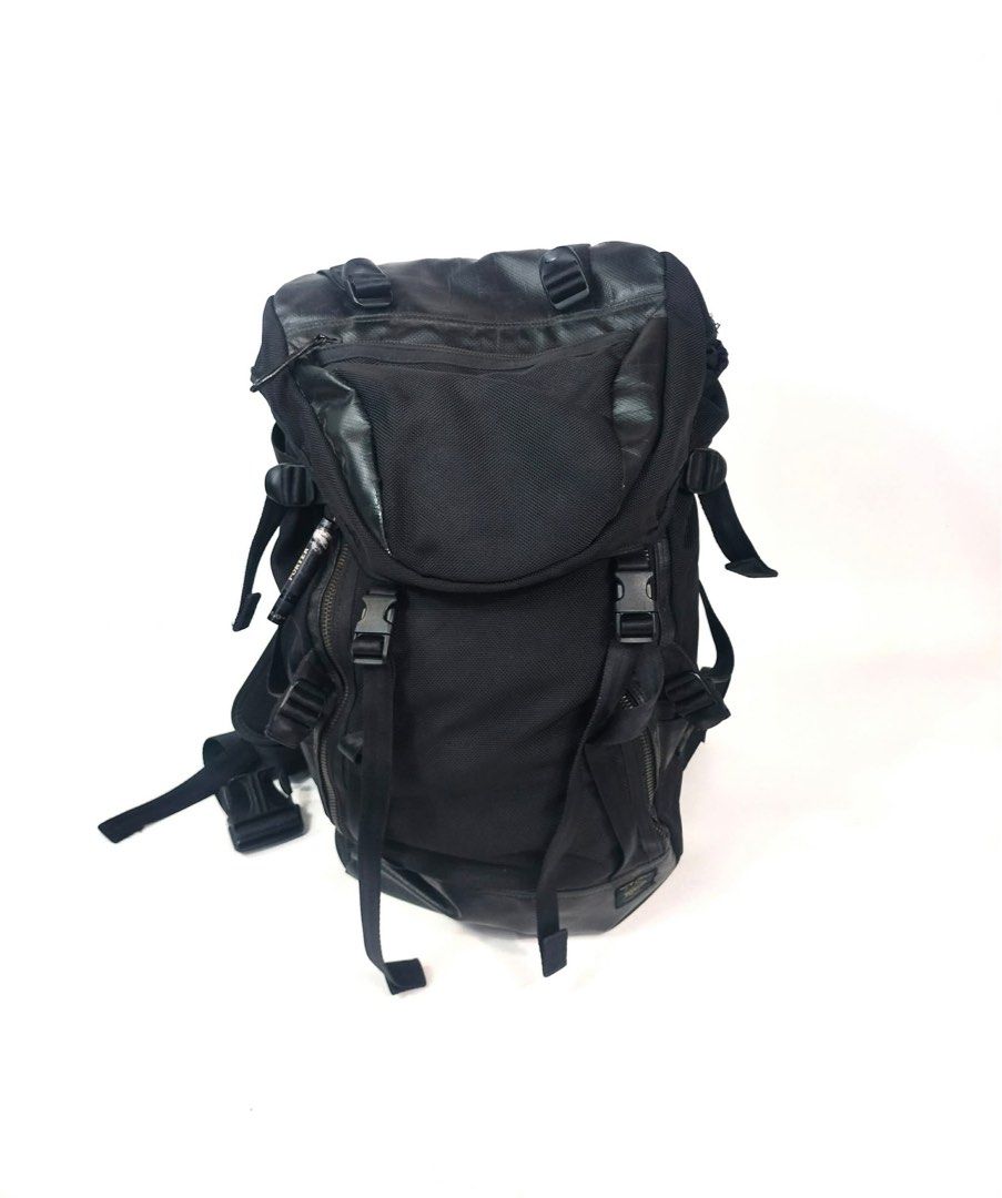 Porter Yoshida & Co. Black Backpack (Category: Backpacks) located in Manila. Submitted by yesterdaysfinds (Listing ID 1460809539, Image 2). Description: - Brand: Porter Yoshida & Co. - Color: Black - Features: Multiple pockets and straps for excellent organization - Comfort: Padded back and shoulder straps - Ideal for: Travel and everyday use - Material: Durable ISSUE - zipper.