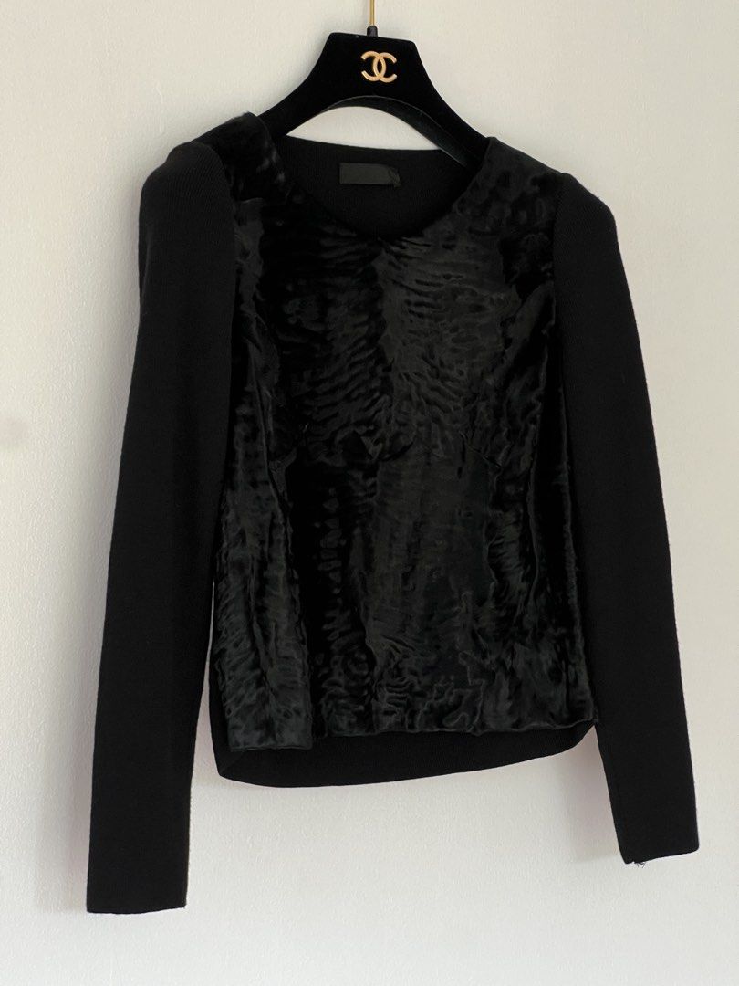 Prada Fall 1998 lamb fur top (Category: Luxury Apparel) located in Quezon City. Submitted by raccoonfur (Listing ID 1460836466, Image 3). Description: Dyed Afghan Lamb and wool sweater from Fall 1998. Miuccia Prada’s take on luxe minimalism. Incredible condition despite being a vintage piece. No holes. Unnoticeable fur stretch on front seam panel. Back panel stretches generously to wear it easily. Flat measurements: Armpit to armpit 37.5cm Length