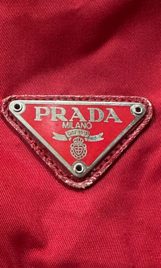 Prada Nylon Red Backpack (Category: Luxury Bags & Wallets) located in Manila. Submitted by christoph17 (Listing ID 1460816821, Image 2). Description: some flaws on leather have chips authentication not guaranteed.