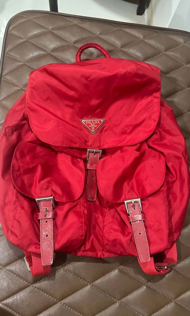 Prada Nylon Red Backpack (Category: Luxury Bags & Wallets) located in Manila. Submitted by christoph17 (Listing ID 1460816821, Image 1). Description: some flaws on leather have chips authentication not guaranteed.
