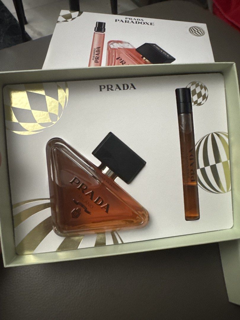 Prada Paradoxe Intense Eau de Parfum Set (Category: Fragrance & Deodorants) located in Manila. Submitted by stoic_shopaholic (Listing ID 1460810332, Image 3). Description: - Authentic Prada Paradoxe Intense Eau de Parfum Set - Set includes a 90ml bottle and a 10ml travel spray - Iconic Prada triangle bottle design - Perfect for gifting or personal use - Experience the captivating intense fragrance RFS Received as a gift, already have my personal 