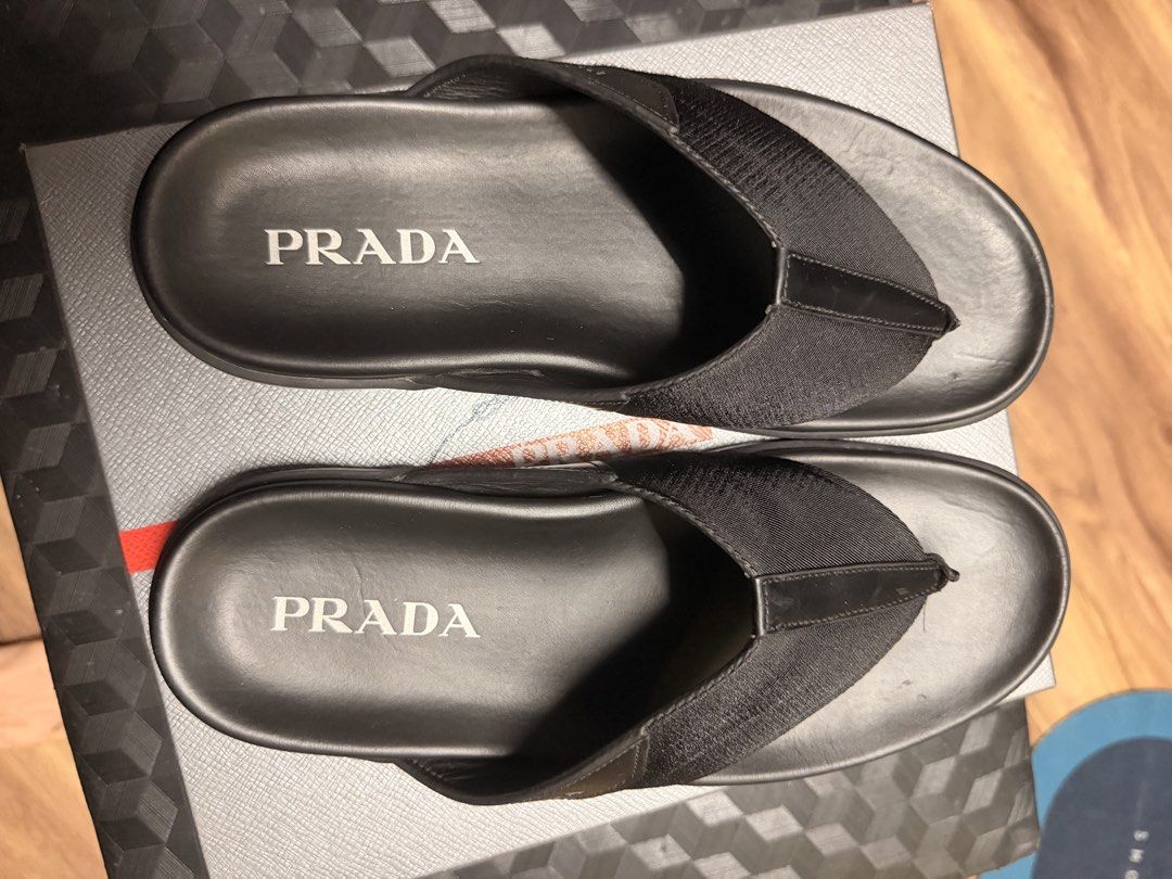 Prada slippers (Category: Slippers & Slides) located in Quezon City. Submitted by carlutot (Listing ID 1460798133, Image 1). Description: Prada slippers Size 9US RFS: naka stock nalang sa shoe rack Barely used and in excellent condition. Only worn a few times and carefully kept in the closet..