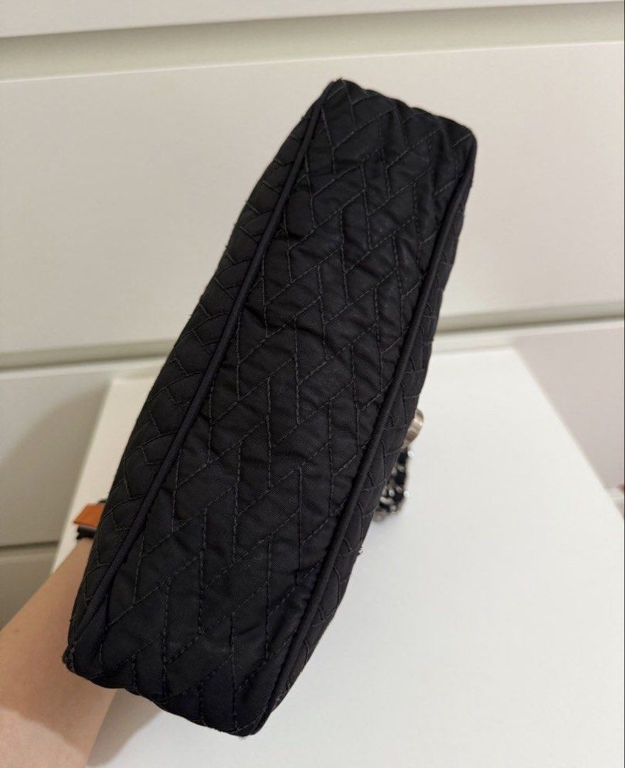 Prada Tessuto Chain Shoulder bag (Category: Shoulder Bags) located in Batangas. Submitted by stopandshopforluxury (Listing ID 1460716072, Image 3). Description: Guaranteed Original 💯 With COA already No flaws, can send more photos upon request. What you see is what you get. Shipping via Lalamove, J&T, and LBC Disclaimer: This is a preloved bag. Actual condition is shown in photos. Expect normal signs of wear. Colors may slightly vary due to ligh