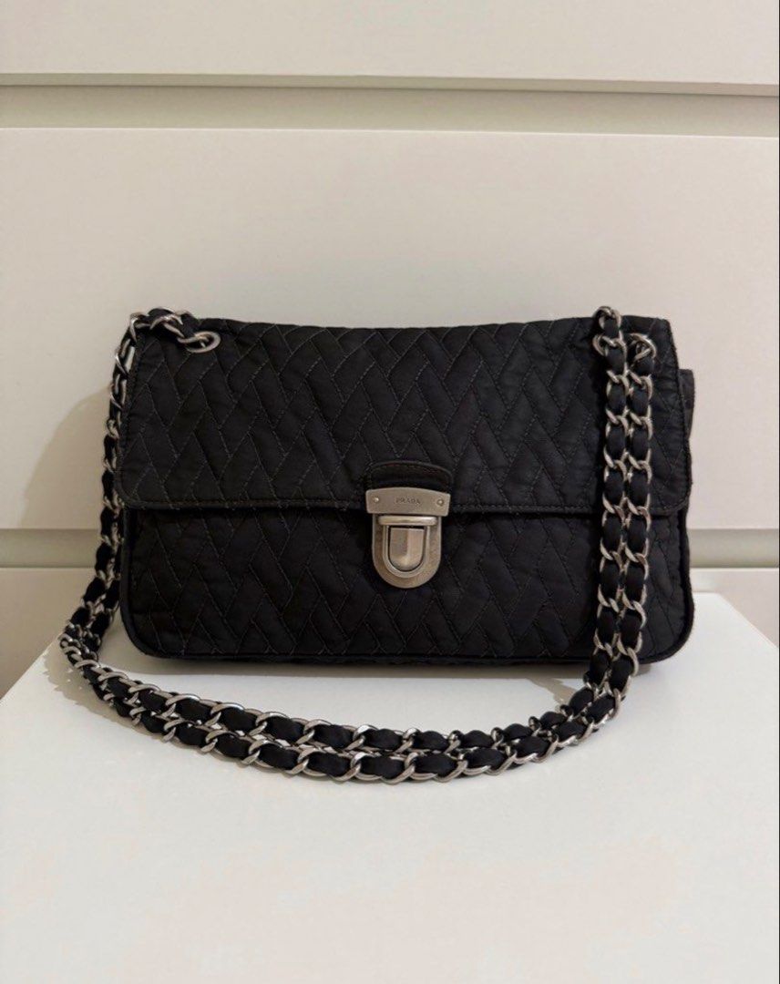 Prada Tessuto Chain Shoulder bag (Category: Shoulder Bags) located in Batangas. Submitted by stopandshopforluxury (Listing ID 1460716072, Image 1). Description: Guaranteed Original 💯 With COA already No flaws, can send more photos upon request. What you see is what you get. Shipping via Lalamove, J&T, and LBC Disclaimer: This is a preloved bag. Actual condition is shown in photos. Expect normal signs of wear. Colors may slightly vary due to ligh