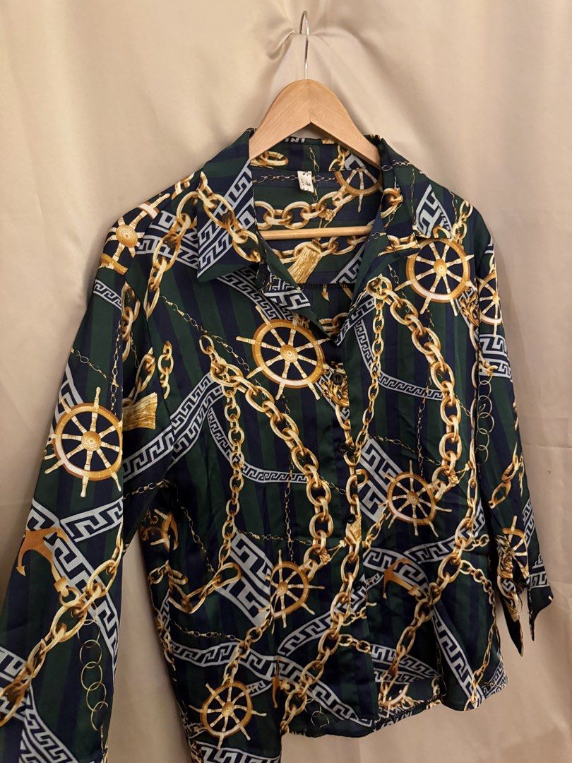 Printed chain buttondown longsleeves (Category: Blouses) located in Manila. Submitted by 414studio (Listing ID 1460897316, Image 3). Description: Freesize fits small to medium.