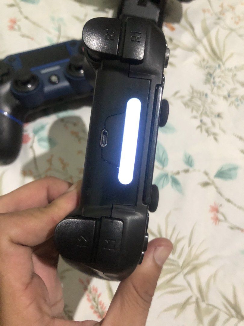 PS4 Controller lot set bundle (Category: Controllers) located in Quezon City. Submitted by markgolveo (Listing ID 1460782870, Image 3). Description: PS4 Controller lot set bundle Read below please Set includes: Youse ps4 controller charging cradle Tested working properly PS4 controller black no power considered as defective PS4 3rd party controllers 2pcs -japan dark blue and black tested working properly good battery life does not fit cradle -Bla