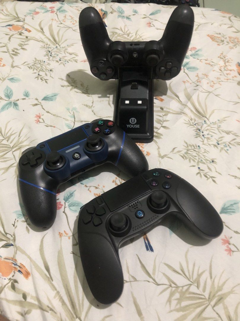 PS4 Controller lot set bundle (Category: Controllers) located in Quezon City. Submitted by markgolveo (Listing ID 1460782870, Image 1). Description: PS4 Controller lot set bundle Read below please Set includes: Youse ps4 controller charging cradle Tested working properly PS4 controller black no power considered as defective PS4 3rd party controllers 2pcs -japan dark blue and black tested working properly good battery life does not fit cradle -Bla
