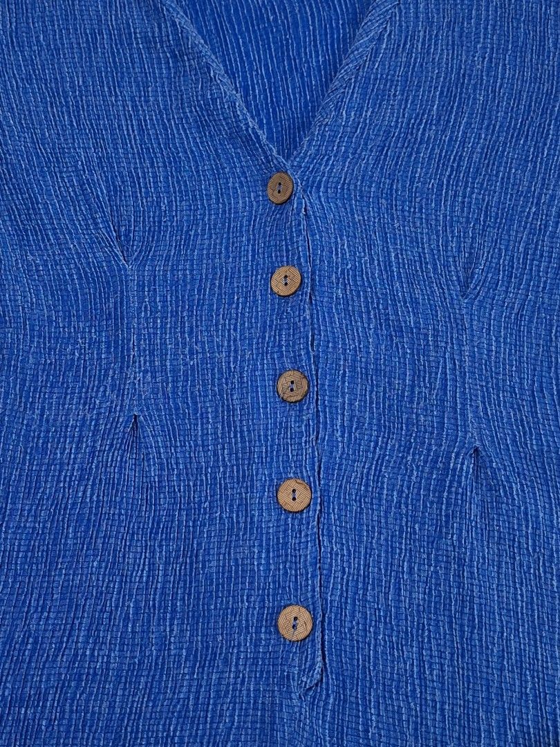 Pull & Bear Blue Textured Button Front Midi Dress (Category: Dresses) located in Taguig. Submitted by butterflypea.thrift (Listing ID 1460885321, Image 3). Description: - size : small on tag but can fit medium to large, bust - 40, waist - 30, length - 33 ( inches measurement) - textured fabric.