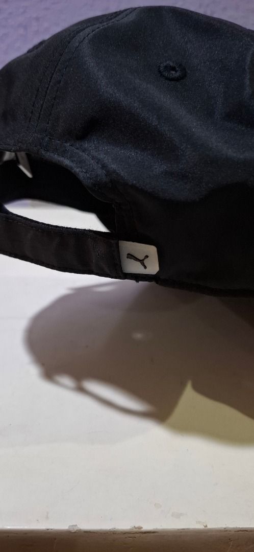 Puma Black Cap with Logo (Category: Caps & Hats) located in Pasig City. Submitted by redrabbit.0711 (Listing ID 1460733267, Image 3). Description: Classic black Puma cap. Features the iconic Puma logo embroidered on the front. Adjustable strap at the back for a comfortable fit. The inside lining has a cool all-over Puma print. Great for everyday wear or sports..
