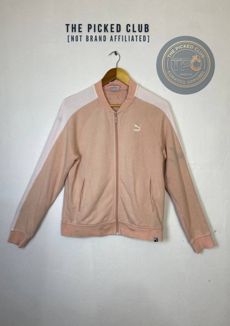 Puma Pink & White Track Jacket (Category: Coats, Jackets and Outerwear) located in Imus. Submitted by thepickedclub (Listing ID 1460840073, Image 1). Description: medium (18x24) - Cute pink Puma track jacket - White sleeves - Full zip closure - Front pockets - Ideal for casual wear or light workouts - Versatile and easy to style.