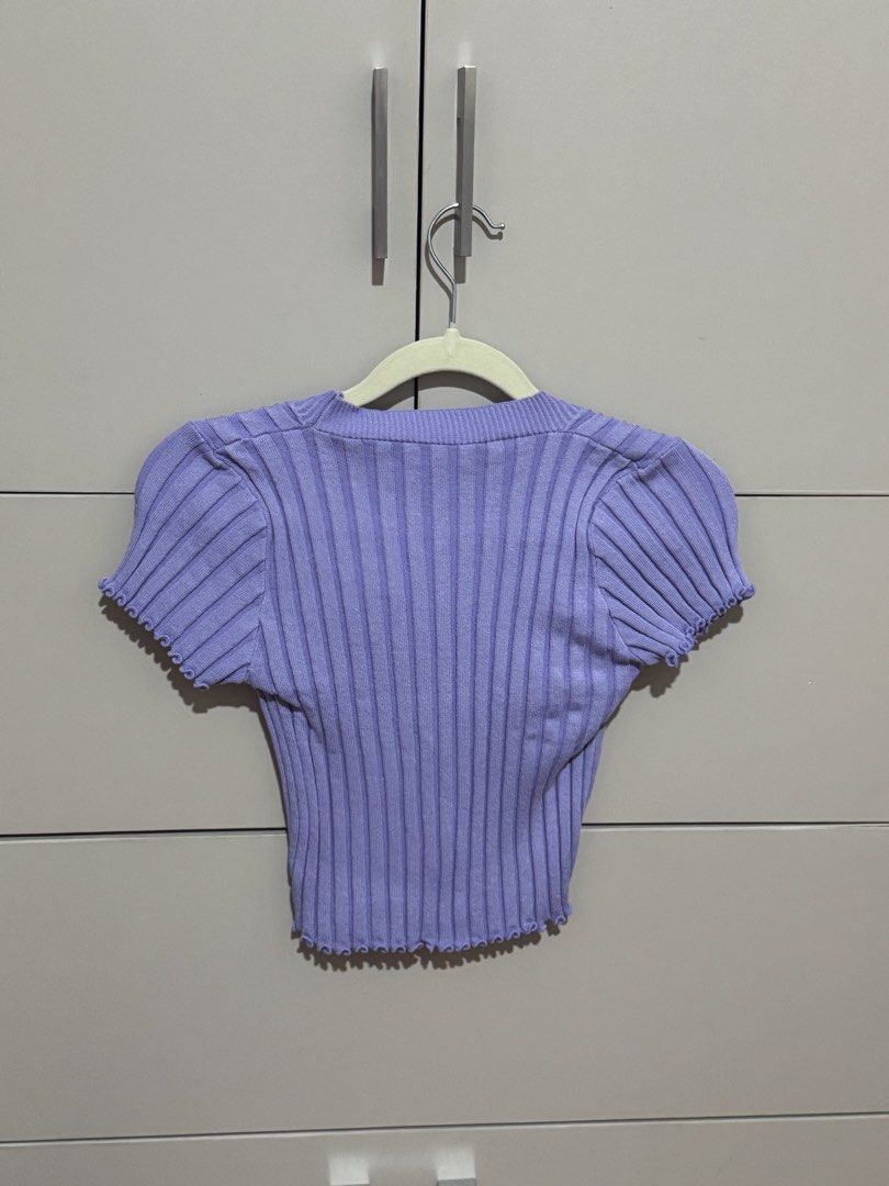 Purple Ribbed Button-Up Cropped Top (Category: Coats, Jackets and Outerwear) located in Antipolo. Submitted by nyeahsells (Listing ID 1460787308, Image 2). Description: Pre-loved Size: S Color: Purple Flaw: None RFS: decluttering Swipe photos to see more details about the item. Disclaimer: - All sales final (NO RETURN, NO EXCHANGE) - Our shop will not be liable for any damages due to mishandling by the courier - Please manage expectations - First