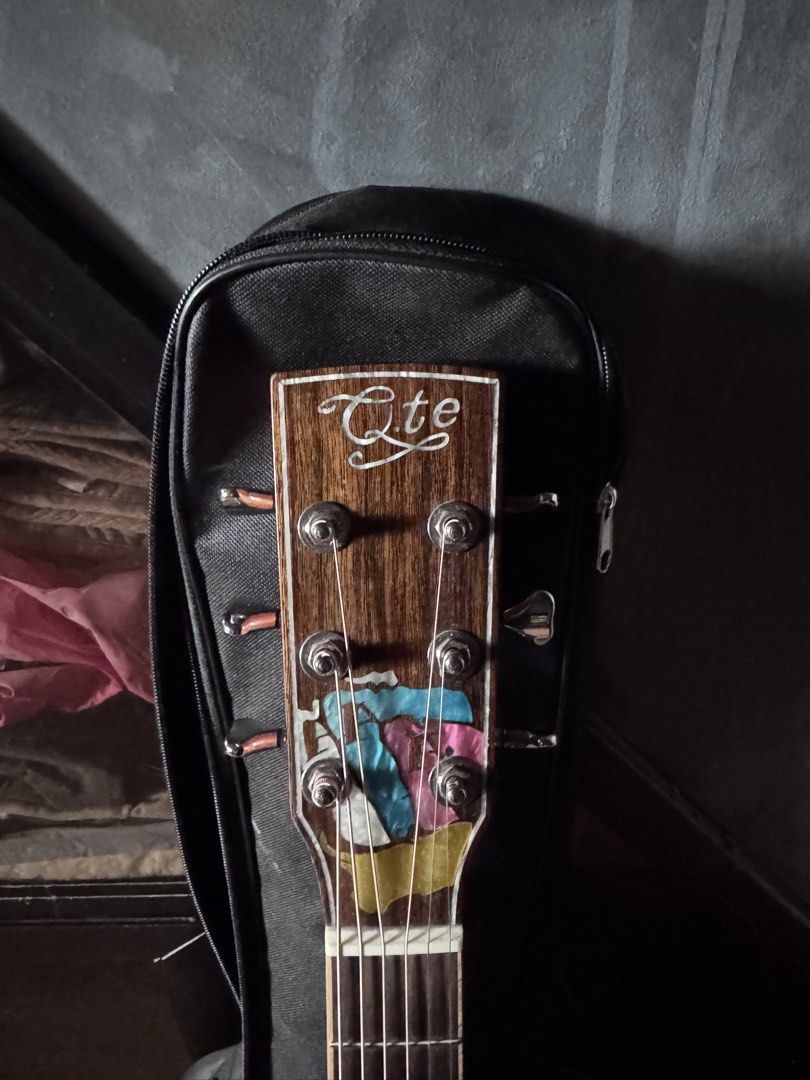 QTE ACOUSTIC GUITAR (Category: Musical Instruments) located in Rizal. Submitted by rnrgzmn (Listing ID 1460801013, Image 1). Description: SMALL ISSUE: - Scratch on body RFS: Need funds for college.