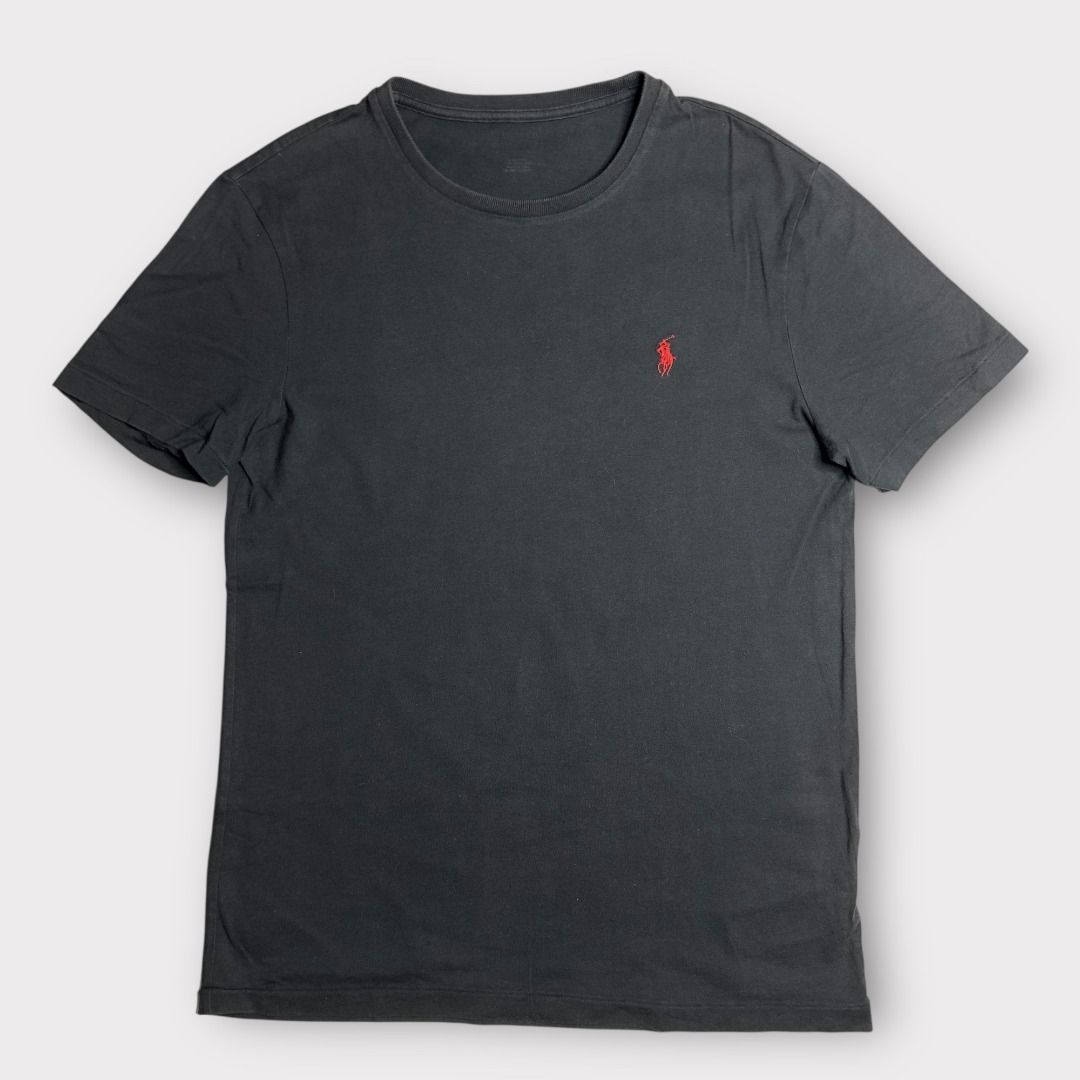Ralph Lauren Black T-Shirt (Category: Tshirts & Polo Shirts ) located in Rizal. Submitted by thebargainbin. (Listing ID 1460725818, Image 1). Description: Ralph Lauren Black T-Shirt Shoulder Width: 17 inches Chest Width: 18 inches Length: 25.5 inches Best Fits: Small Size on Tag: n/a Condition: Excellent Issues: none Price: 199 - Color may vary due to lighting - Re-evaluate the description and photos before buying - Items are thrifted/pre-loved s