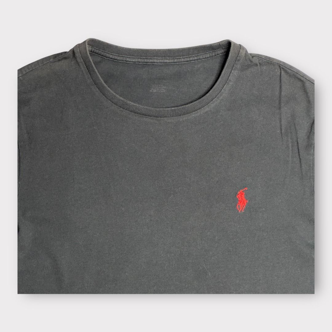 Ralph Lauren Black T-Shirt (Category: Tshirts & Polo Shirts ) located in Rizal. Submitted by thebargainbin. (Listing ID 1460725818, Image 2). Description: Ralph Lauren Black T-Shirt Shoulder Width: 17 inches Chest Width: 18 inches Length: 25.5 inches Best Fits: Small Size on Tag: n/a Condition: Excellent Issues: none Price: 199 - Color may vary due to lighting - Re-evaluate the description and photos before buying - Items are thrifted/pre-loved s