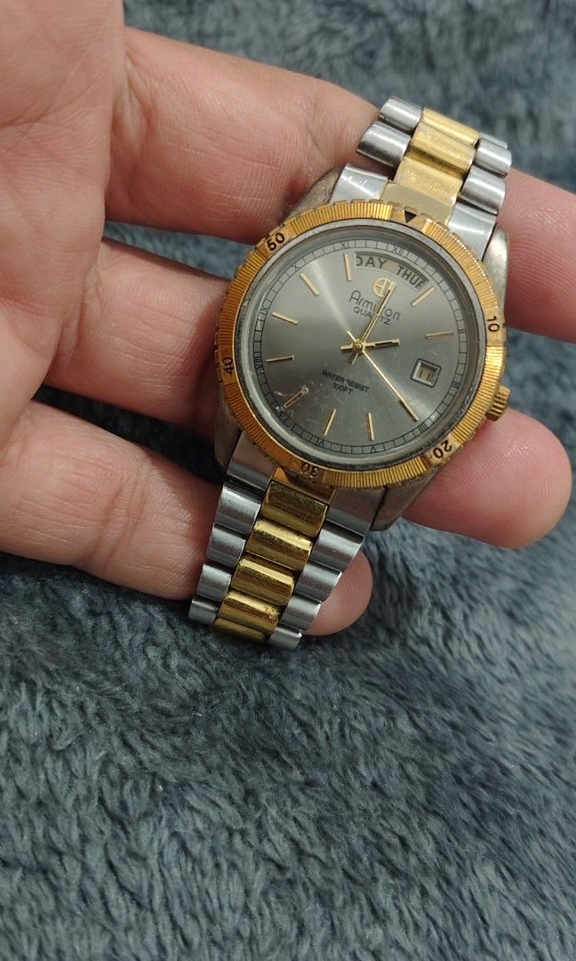 Rare Vintage Amitron President (Category: Men's Watches) located in Cebu City. Submitted by aceoftime (Listing ID 1460908379, Image 3). Description: Im good condition Japanese analog quartz with presidential configuration day-date display Beautifu fluted bezel details Silver sunburst dial with gold accent indices Watch only Our Guarantee: 💯 Authentic All watches are checked by our experienced technician to ensure good functionality Please manage