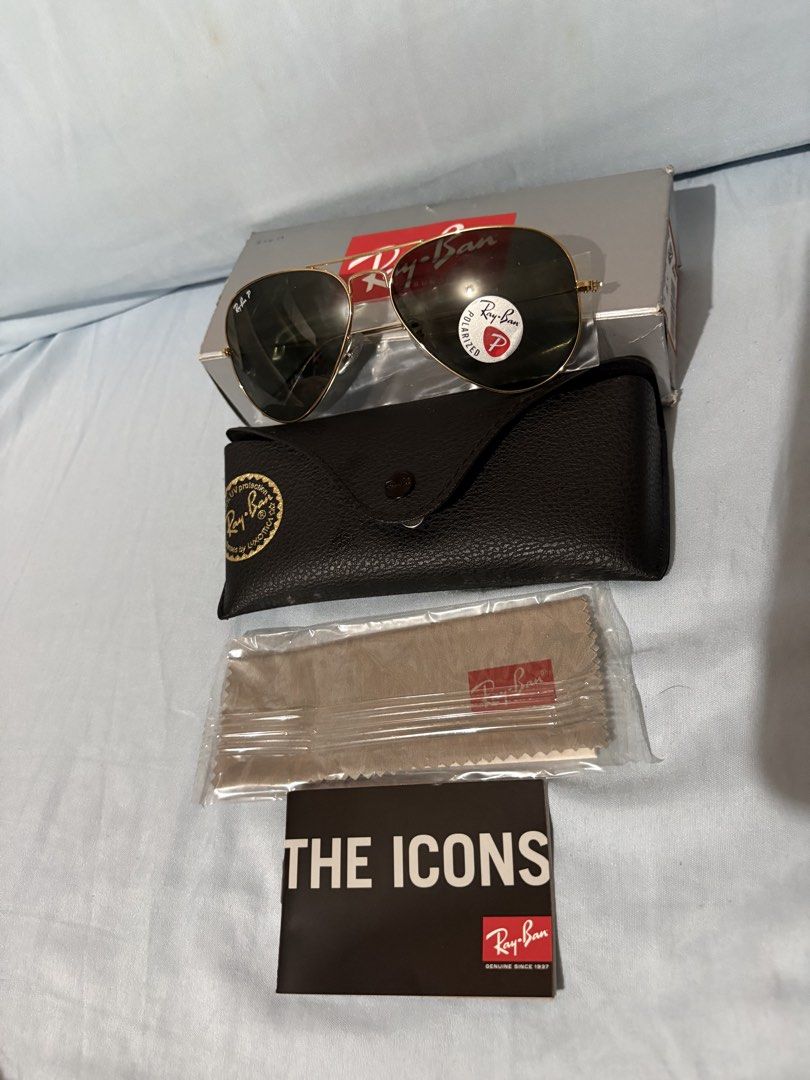 Rayban Aviator (Category: Sunglasses & Eyewear) located in Paranaque City. Submitted by heisam99 (Listing ID 1460751774, Image 2). Description: - Brand: Ray-Ban - Model: Aviator - Features: Polarized lenses - Condition: Great, includes original box, case, and cleaning cloth .