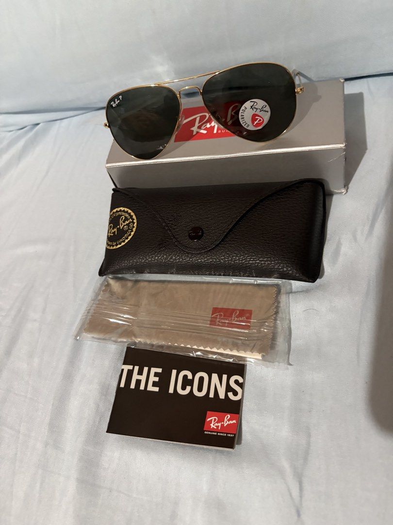 Rayban Aviator (Category: Sunglasses & Eyewear) located in Paranaque City. Submitted by heisam99 (Listing ID 1460751774, Image 3). Description: - Brand: Ray-Ban - Model: Aviator - Features: Polarized lenses - Condition: Great, includes original box, case, and cleaning cloth .