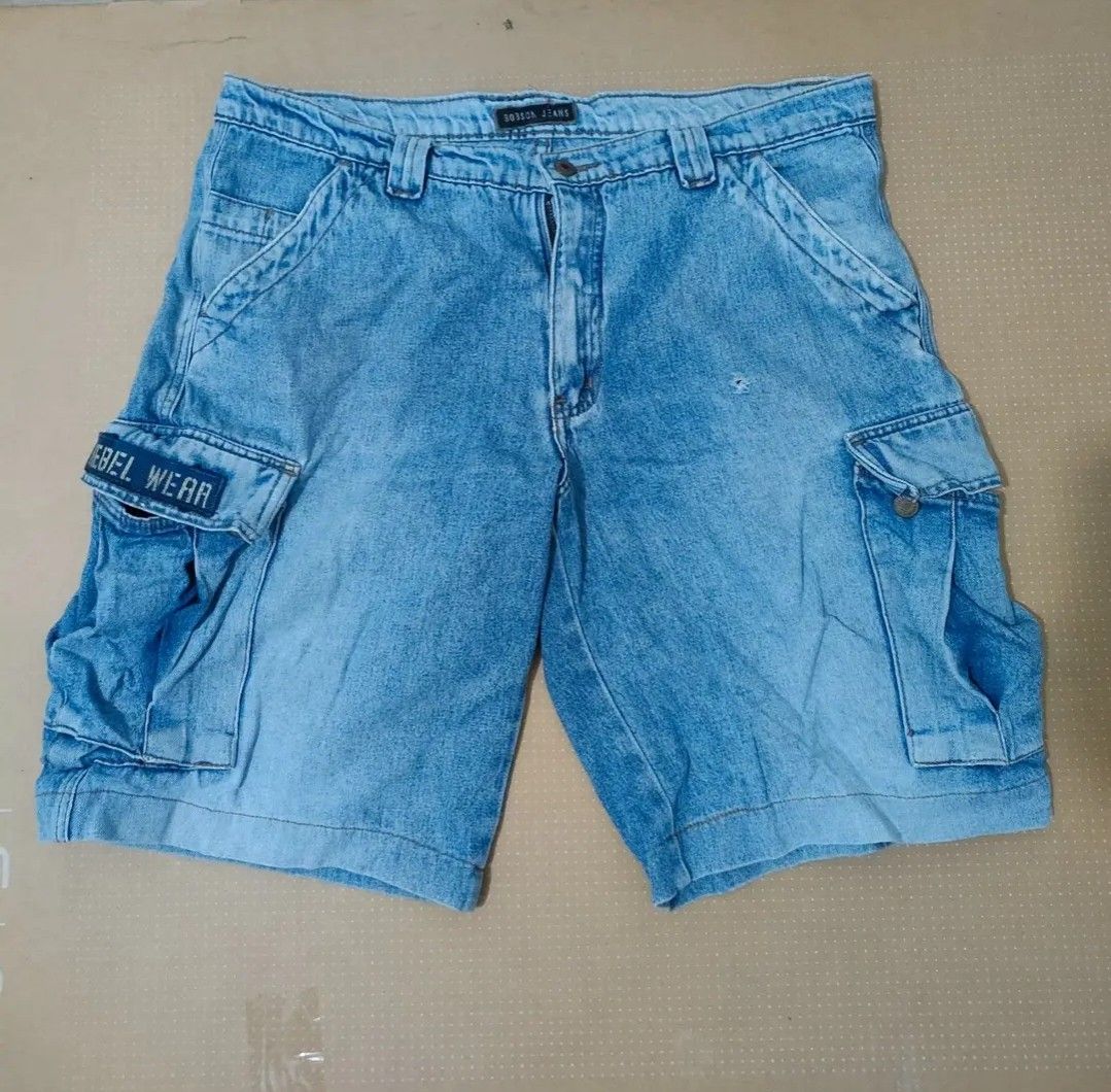 Rebel Wear Denim Cargo Shorts (Category: Jeans) located in General Santos City (Dadiangas). Submitted by rjb21 (Listing ID 1460891048, Image 1). Description: - Light wash denim cargo shorts - Multiple pockets for storage - Two leg pockets with secure button closures - 'Rebel Wear' patch detail on left cargo pocket - Classic fit, perfect for everyday casual style.