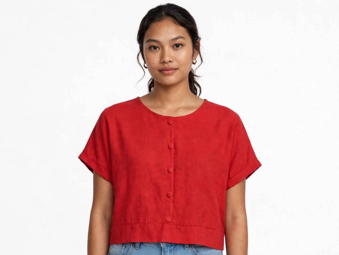 Red Button Up Cropped Top#43 (Category: Blouses) located in Caloocan City. Submitted by outfitloop (Listing ID 1460765841, Image 1). Description: - Cute red cropped top - Short sleeves with rolled cuffs - Button-up front closure IMPORTANT: • 1st photo is an AI styling/model preview for reference on how the item may look when worn. • Please refer to the actual photos for the item’s true appearance and condition. • Color may slightly vary due to li