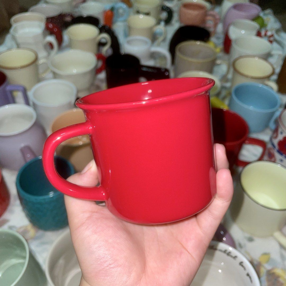 Red Enamel Mug (Category: Coffee & Tea Tableware) located in Valenzuela. Submitted by baekhyunie_pau (Listing ID 1460806995, Image 1). Description: - Classic bright red enamel mug - Ideal for coffee, tea, or soup - Sturdy and durable construction - Perfect for camping adventures or everyday use - Ready for a new home - don't miss out!.