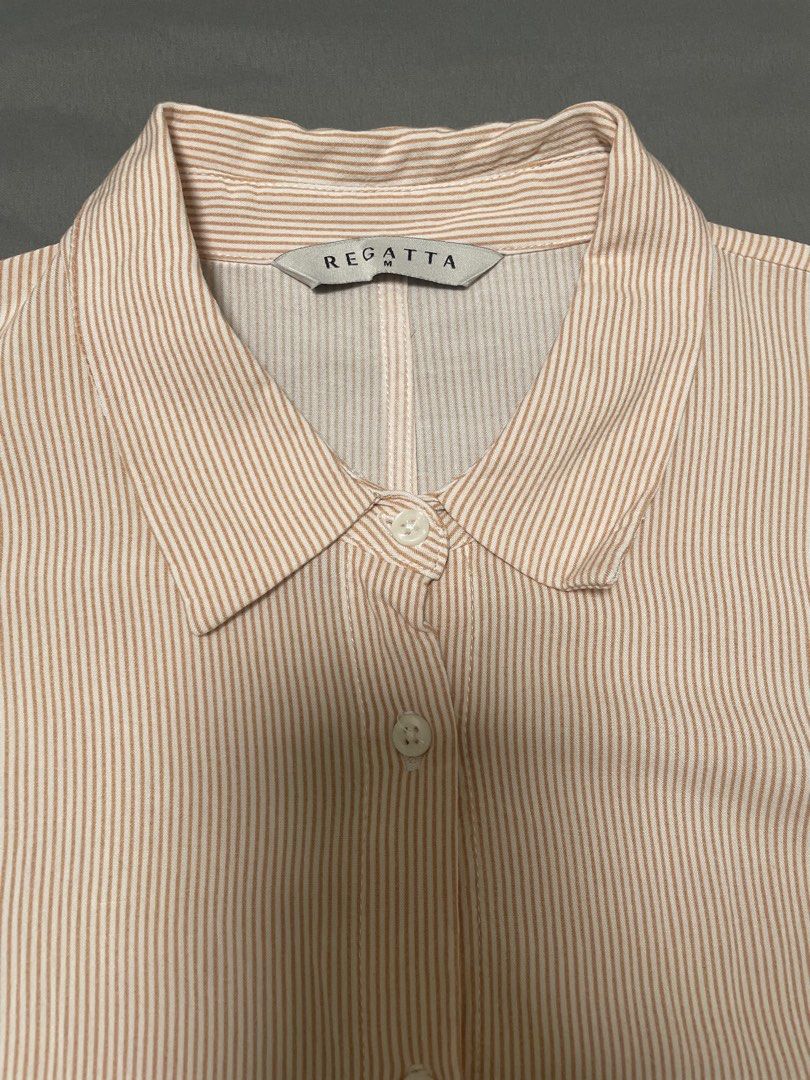Regatta Extended Sleeves Polo (Category: Blouses) located in Quezon City. Submitted by mfordma (Listing ID 1460894942, Image 2). Description: PRELOVED Doing a little closet decluttering! ✨ Letting go of some preloved pieces that are still in great condition and looking for a new home. 🤍 Brand: Regatta Size: Medium Color: Rust and white Description: - Extended sleeves stripes polo - Button-up front - Cotton relaxed fit Measurements Bust (relaxed)