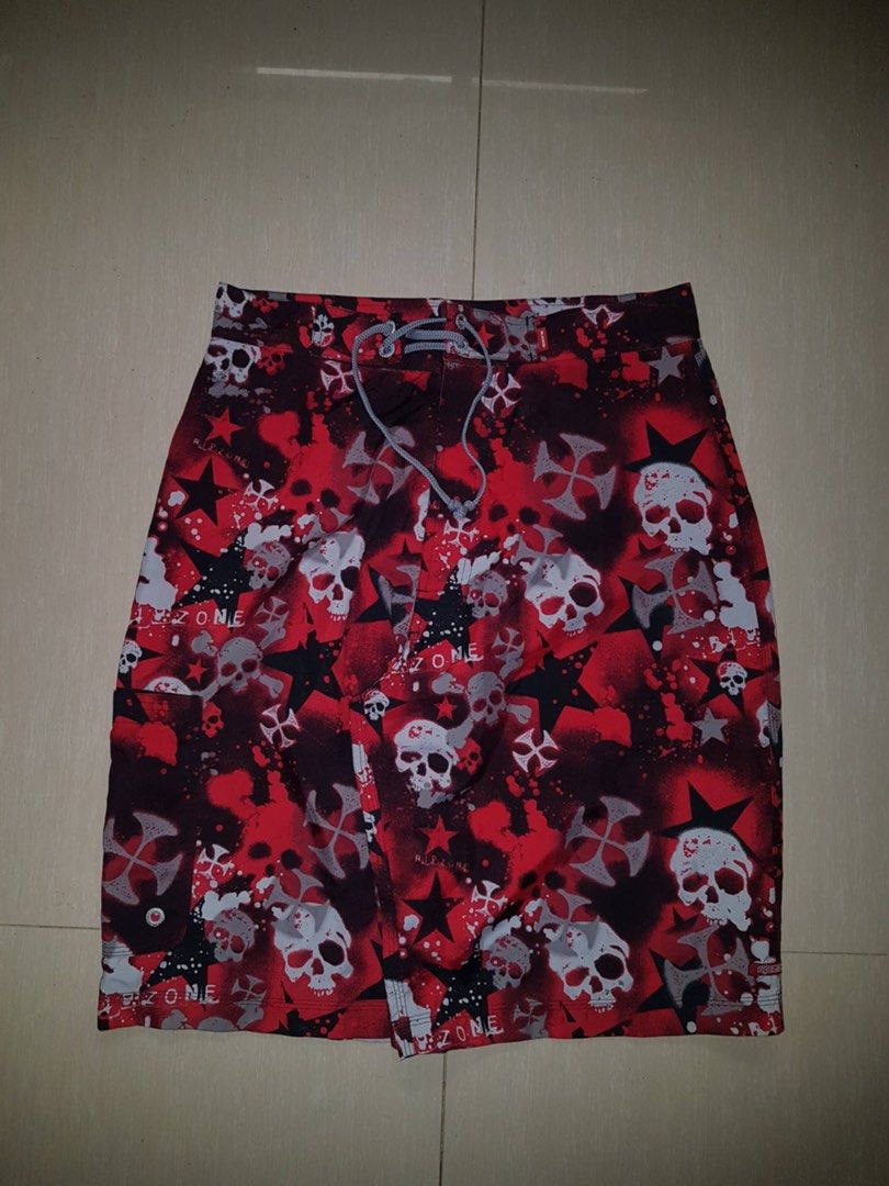 Ripzone Skull & Crossbones Board Shorts Size 32 (Category: Swim Trunks & Board Shorts) located in Bauang. Submitted by drie_02 (Listing ID 1460778393, Image 1). Description: - Ripzone board shorts - Size 32 - Edgy red, black, and white skull and crossbones print - Made in Korea - 100% polyester - Ideal for swimming or lounging - Drawstring waist for adjustable fit.