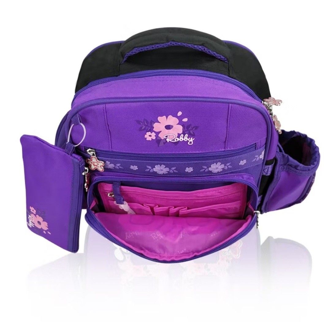 Robby Rabbit Flower Power Purple Backpack (Category: Babies & Kids Fashion) located in Quezon City. Submitted by lisolette (Listing ID 1460817064, Image 2). Description: - Adorable purple backpack from Robby Rabbit - Multiple compartments and pockets for organization - Includes a side water bottle holder - Comes with a detachable pouch - Smooth and easy-to-use zippers - Ideal for school or everyday adventures excellent condition, clean, from pet-