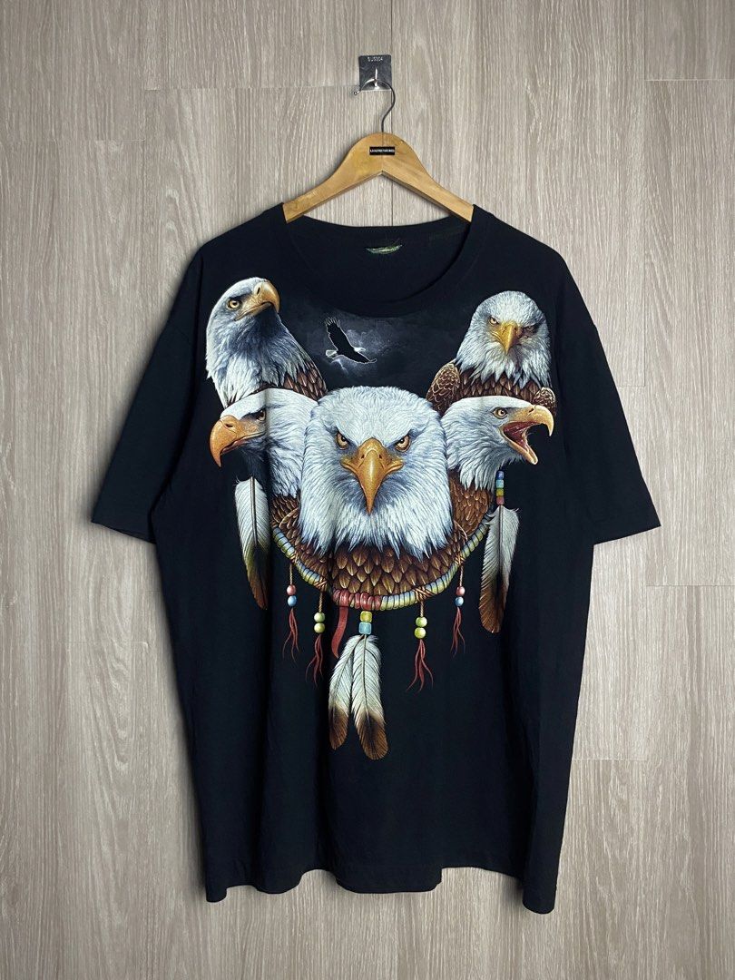 ROCK EAGLE WRAP AROUND TEE (Category: Tshirts & Polo Shirts ) located in Marikina City. Submitted by ilayastreetarchives_ (Listing ID 1460862643, Image 1). Description: ROCK EAGLE WRAP AROUND TEE Size tagged: N/A (XL/XXL fit) Width/Waist: 25 Length: 30 Condition: 9.5/10 (excellent) Issue: None / cut tag Color rate: 9.5/10 M/mine: 510 PHP.
