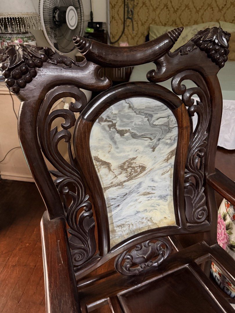 Rocking chair (Category: Chairs) located in Quezon City. Submitted by redcherry131 (Listing ID 1460866081, Image 3). Description: Vietnam Rosewood with marble back. Intricate rose flower design. Custom made. Very thick solid wood. Very beautiful in person. .