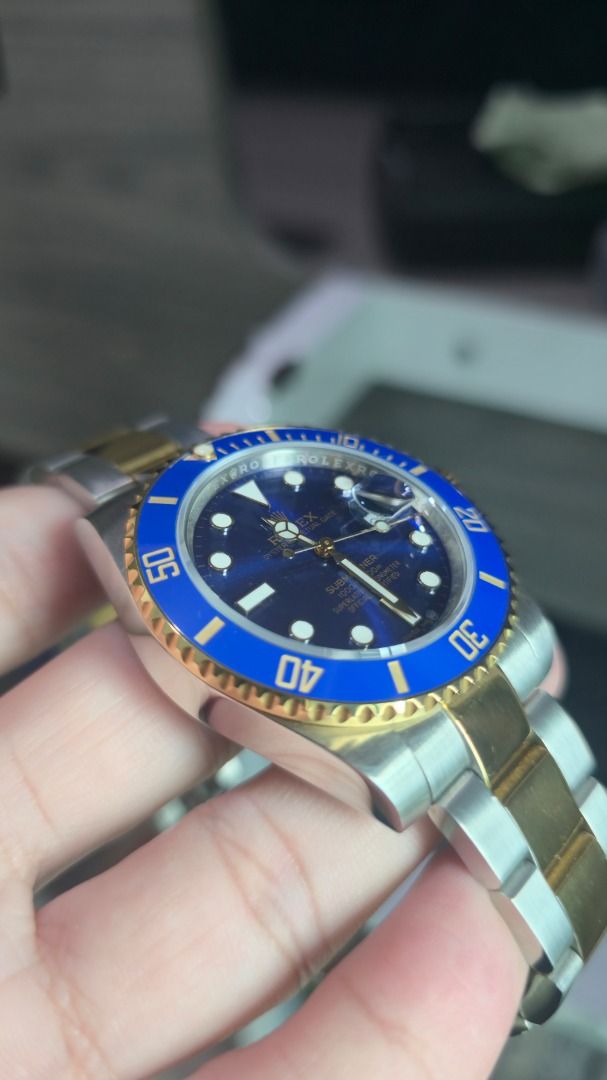 Rolex Submariner Two-Tone Blue Dial Automatic Watch (Category: Luxury Watches) located in Caloocan City. Submitted by kieschz0810 (Listing ID 1460720071, Image 2). Description: - Midtier Clone (Swiss 3135 Movement) - 2.5x Date Window Magnification Unlike Japan Clones - Thin Rehaut Similar to OG - Blue Lume Selling for rush price for our anniversary expenses.