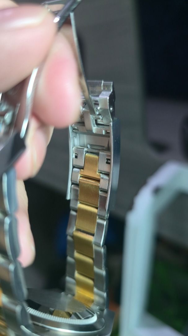Rolex Submariner Two-Tone Blue Dial Automatic Watch (Category: Luxury Watches) located in Caloocan City. Submitted by kieschz0810 (Listing ID 1460720071, Image 3). Description: - Midtier Clone (Swiss 3135 Movement) - 2.5x Date Window Magnification Unlike Japan Clones - Thin Rehaut Similar to OG - Blue Lume Selling for rush price for our anniversary expenses.