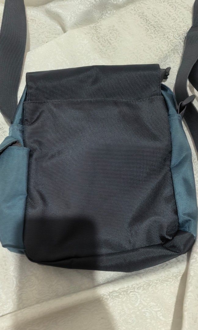 Samsonite nylon in blue and gray color (Category: Cross-body Bags) located in Tuguegarao City. Submitted by zenphoenix-7ad615 (Listing ID 1460853560, Image 3). Description: With minimal. Flaw small bubbles 7 by 9 inches.