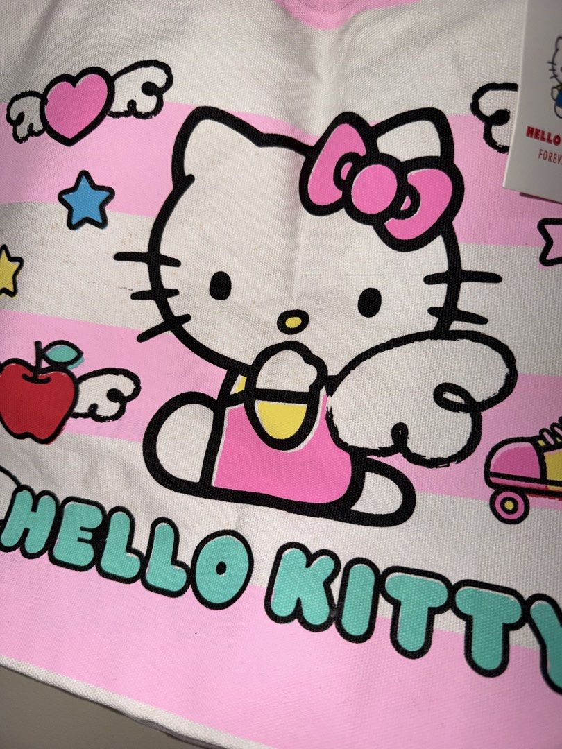 Sanrio Hello Kitty Pink Canvas Tote Bag (Category: Tote Bags) located in Binan City. Submitted by jaewinhaul (Listing ID 1460793834, Image 3). Description: - Has minimal unnoticeable dot stains but never been used. Can be cleaned. Still with tag on. - Location: Biñan City, Laguna - Payment: Gcash.