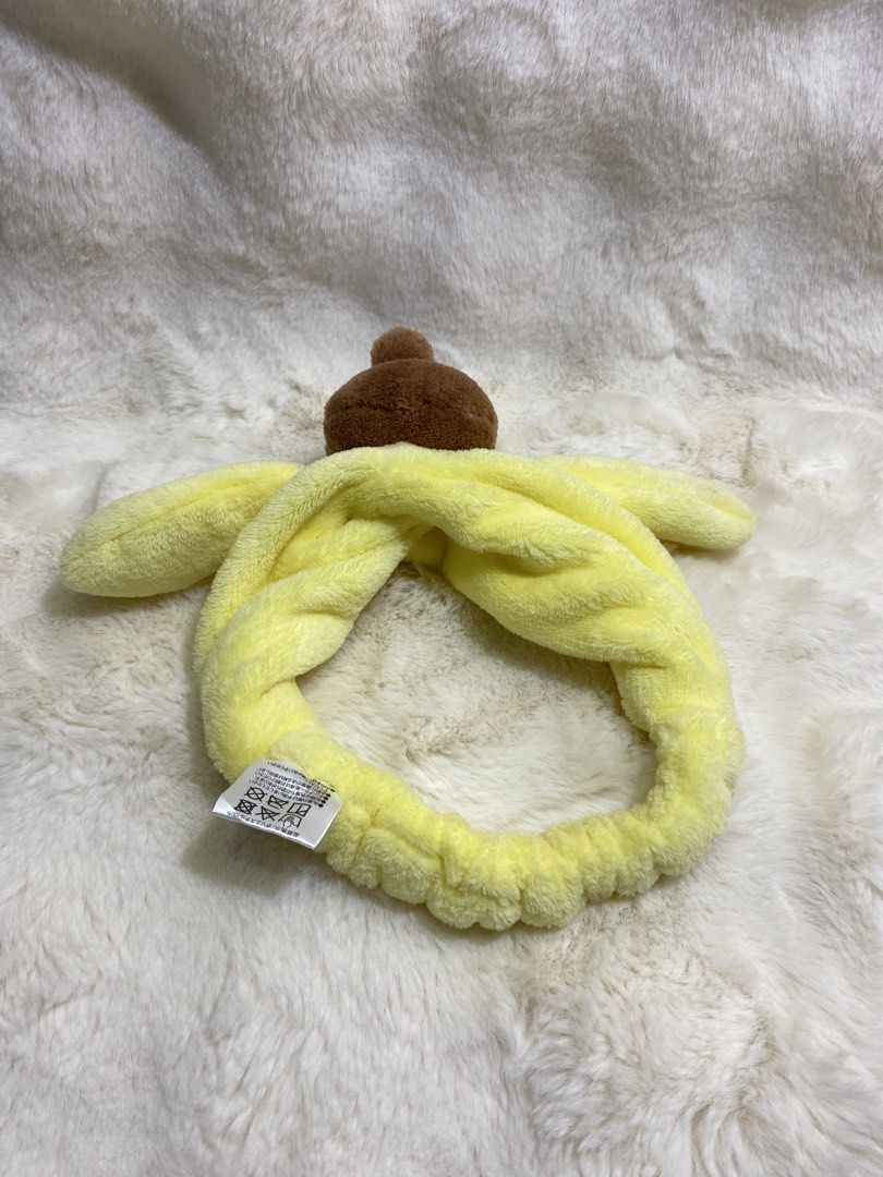 Sanrio Pompompurin Plush Headband (Category: Hair Accessories) located in Kalibo. Submitted by ollie_stuffshop (Listing ID 1460912763, Image 2). Description: Before you send your inquiries: ❗️Last Price is already posted ❗️Manage your expectations, WYSIWYG ❗️May need washing ❗️Dropoff is every Wednesday & Sunday - Adorable Pompompurin design - Made from soft yellow plush material - Ideal for keeping hair off your face during skincare or makeup ro