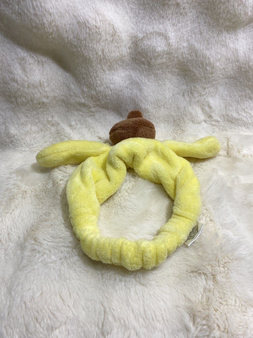 Sanrio Pompompurin Plush Headband (Category: Hair Accessories) located in Kalibo. Submitted by ollie_stuffshop (Listing ID 1460912763, Image 1). Description: Before you send your inquiries: ❗️Last Price is already posted ❗️Manage your expectations, WYSIWYG ❗️May need washing ❗️Dropoff is every Wednesday & Sunday - Adorable Pompompurin design - Made from soft yellow plush material - Ideal for keeping hair off your face during skincare or makeup ro