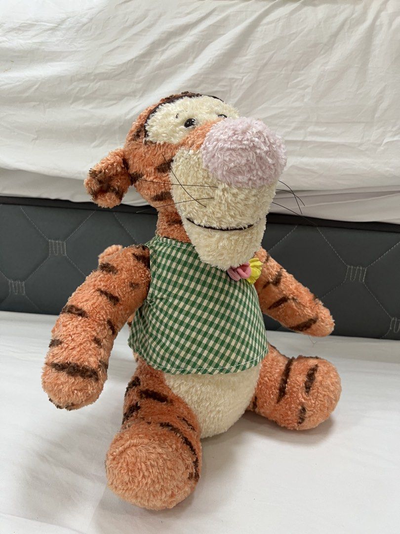 SEGA Disney Tigger Plush Toy (Category: Plushies & Soft Toys) located in Muntinlupa City. Submitted by goldinmygarage (Listing ID 1460879614, Image 2). Description: - SEGA Tigger Plush Toy - No stains and smell -Very Classic Looking - Features a charming green checkered vest - Ideal for collectors and Winnie the Pooh enthusiasts.
