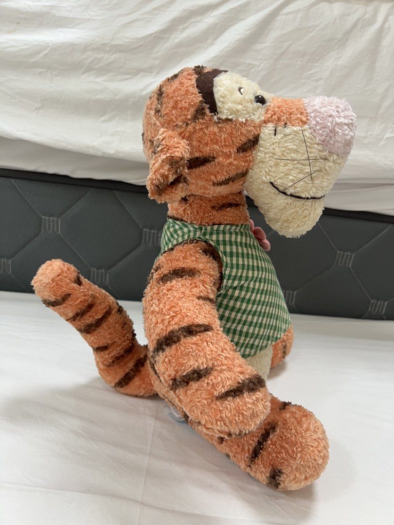 SEGA Disney Tigger Plush Toy (Category: Plushies & Soft Toys) located in Muntinlupa City. Submitted by goldinmygarage (Listing ID 1460879614, Image 3). Description: - SEGA Tigger Plush Toy - No stains and smell -Very Classic Looking - Features a charming green checkered vest - Ideal for collectors and Winnie the Pooh enthusiasts.