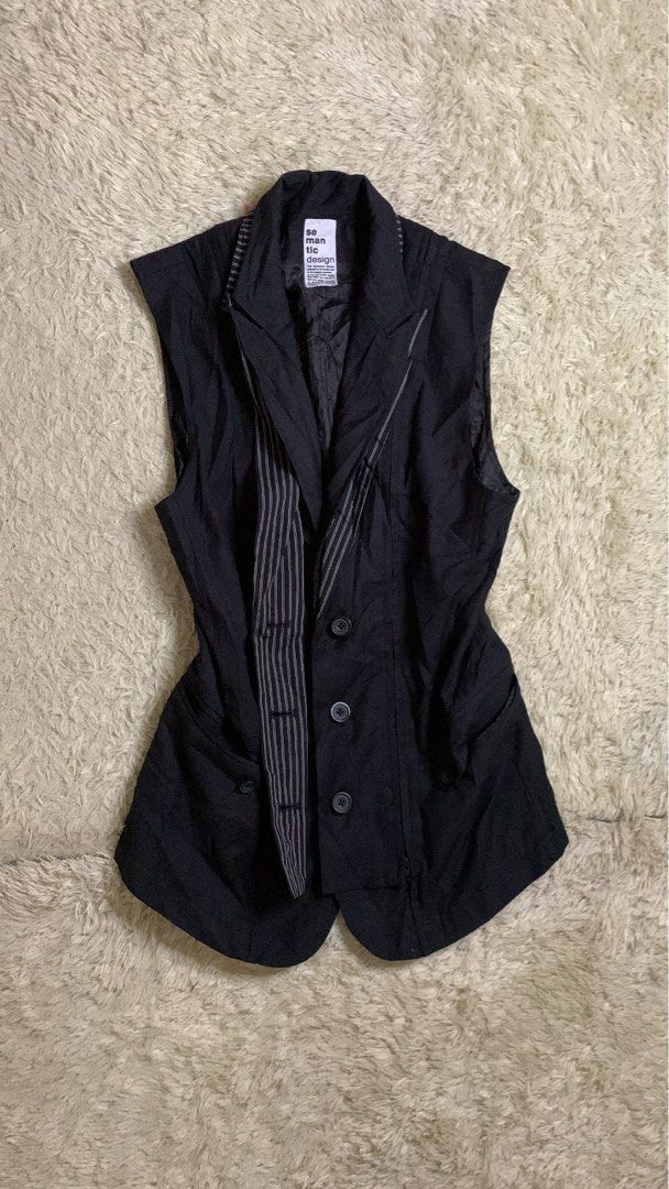 Semantic design asymmetrical vest (Category: Activewear) located in Aloran. Submitted by cowskin_927 (Listing ID 1460753080, Image 2). Description: Semantic design vest Width 18 Length 26 No flaws.