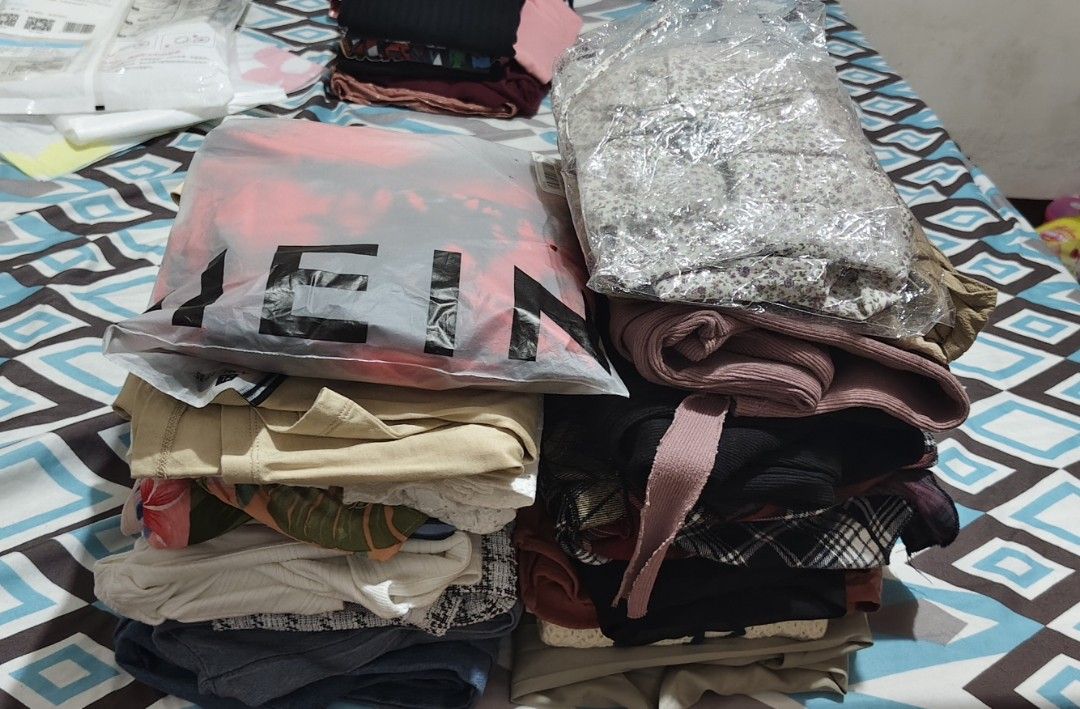 SHEIN & Assorted Women's Clothing Bundle (Category: Blouses) located in Cainta. Submitted by f3bnew_preloveditems (Listing ID 1460727457, Image 2). Description: - Bundle of women's clothing, some are Used once, some are slightly used and some are UNUSED. - Includes items from SHEIN , UNIQLO and other brands. - Assortment of tops, some bottoms and dress - Features various styles and colors to suit your taste. - All items are neatly folded and read