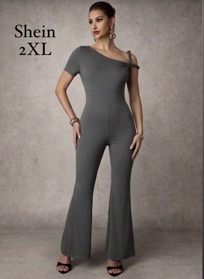 Shein Grey One-Shoulder Flared Jumpsuit 2XL (Category: Jumpsuits) located in Quezon City. Submitted by mommyclutter (Listing ID 1460818057, Image 1). Description: - Grey one-shoulder jumpsuit from Shein - Size: 2XL - Features a tie detail on the shoulder - Flared leg design - Comfortable and stylish - Perfect for dressing up or down.