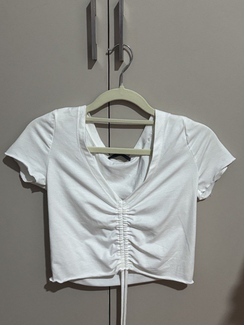 SHEIN White Ruched Drawstring Crop Top Size S (Category: Blouses) located in Antipolo. Submitted by nyeahsells (Listing ID 1460775088, Image 1). Description: Pre-loved Size: S Color: White Flaw: None RFS: decluttering Swipe photos to see more details about the item. Disclaimer: - All sales final (NO RETURN, NO EXCHANGE) - Our shop will not be liable for any damages due to mishandling by the courier - Please manage expectations - First to pay gets