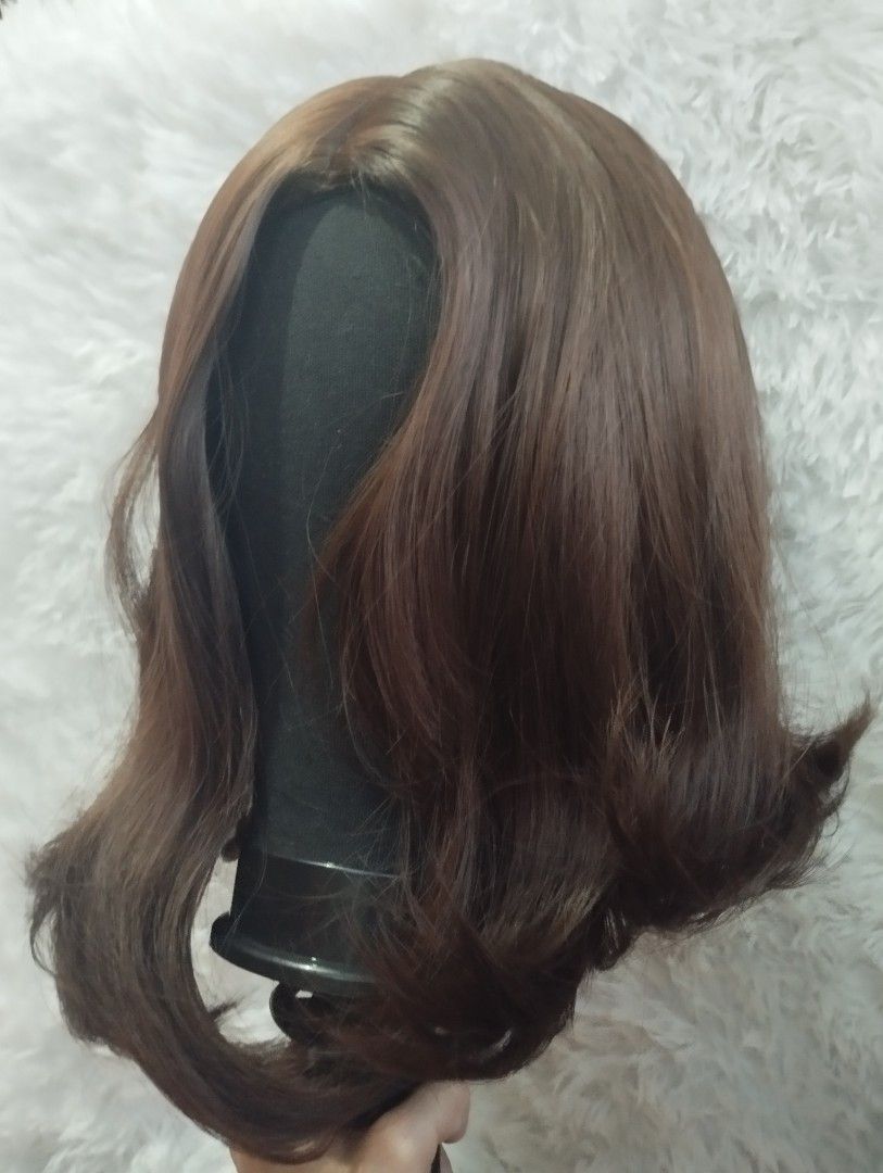 Short Brown Wig - Seven Queen Brand (Category: Hair Accessories) located in Valenzuela. Submitted by maehrshmallow (Listing ID 1460740570, Image 1). Description: - Short Brown wig - Styled with soft, natural-looking waves - Seven Queen Brand - Looks Realistic - Can be used for Natasha Romanoff Cosplay - Wig stand not included.