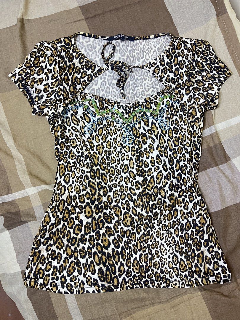 Short-sleeve leopard print top (Category: Others Tops) located in San Jose. Submitted by thymies (Listing ID 1460771989, Image 1). Description: .