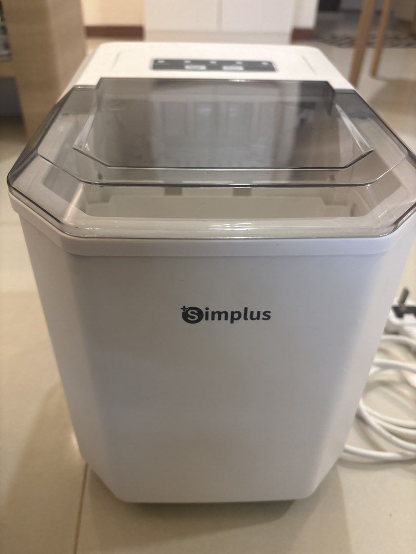 Simplus Ice Maker (Category: Other Home Appliances) located in Singapore. Submitted by eeveeelllyynnnnnnn (Listing ID 1460770335, Image 2). Description: - Simplus Ice Maker - Makes 9 ice cubes within a few minutes - Choose between small or large ice cubes - Comes with an ice scoop -Easy to use -Bought it for around $100+ and used a few times .