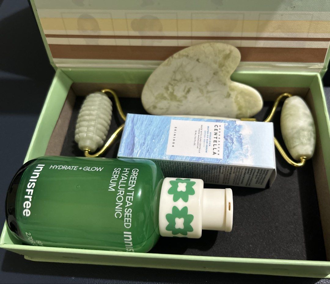 Skin1004 & Innisfree Serum (Category: Face Care) located in Marikina City. Submitted by decluttering.matters (Listing ID 1460874315, Image 2). Description: NEW: Skin1004 Madagascar Centella Hyalu-Cica Water-Fit Sun Serum Trial size: 15ml (Sealed; Exp: 18 March 2029) USED: Innisfree Green Tea Seed Hyaluronic Serum 80ml (around 80% remaining; Exp: 15 July 2027) FREE: Jade Roller & Guasha (used, with small tarnished parts in the handle - see photos)